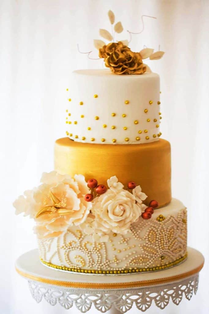 Elegant gold and white wedding cake in Howick KZN Midlands