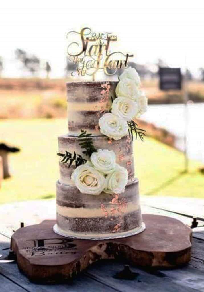 Elegant semi naked wedding cake with rose gold leaf in Howick KZN Midlands
