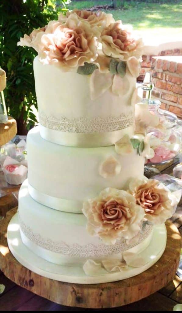 Pretty white wedding cake with pink roses in Howick KZN Midlands